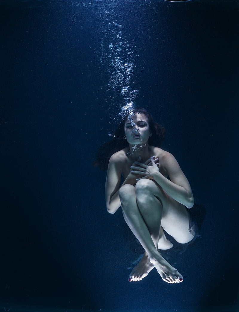 Person meditating and breathing